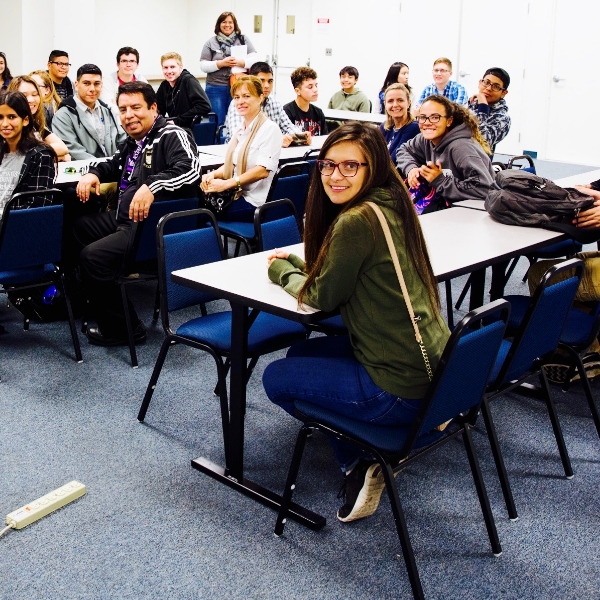 Marisol (center, in green outfit) participated in the field trip to NASA.