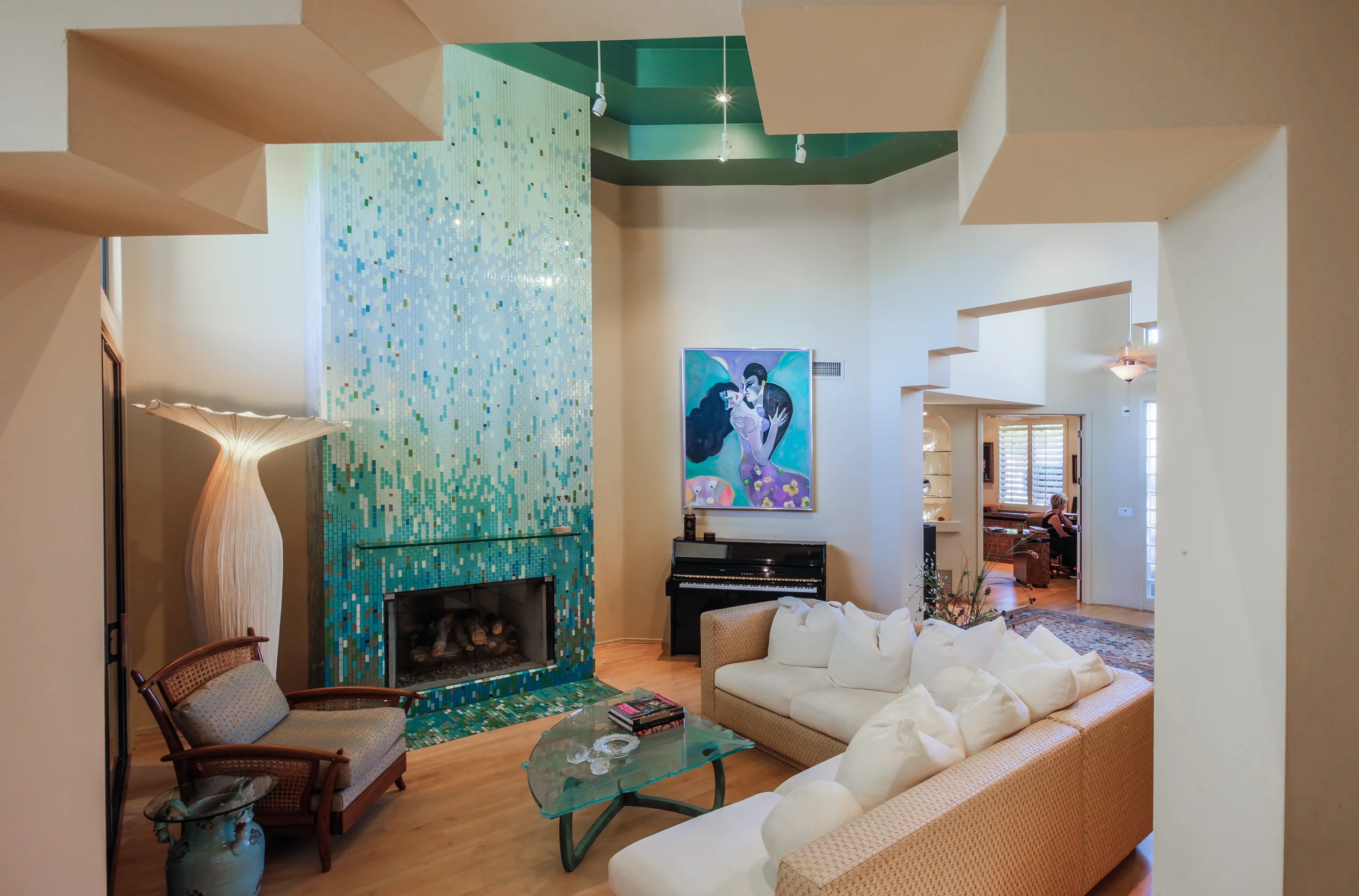  Services provided: custom furniture design, mosaic fireplace design, paint selection, carpet and area rug selection, patio mural concept, upholstered walls and Powder Room design.        Photos: Pat Kofahl Photography 