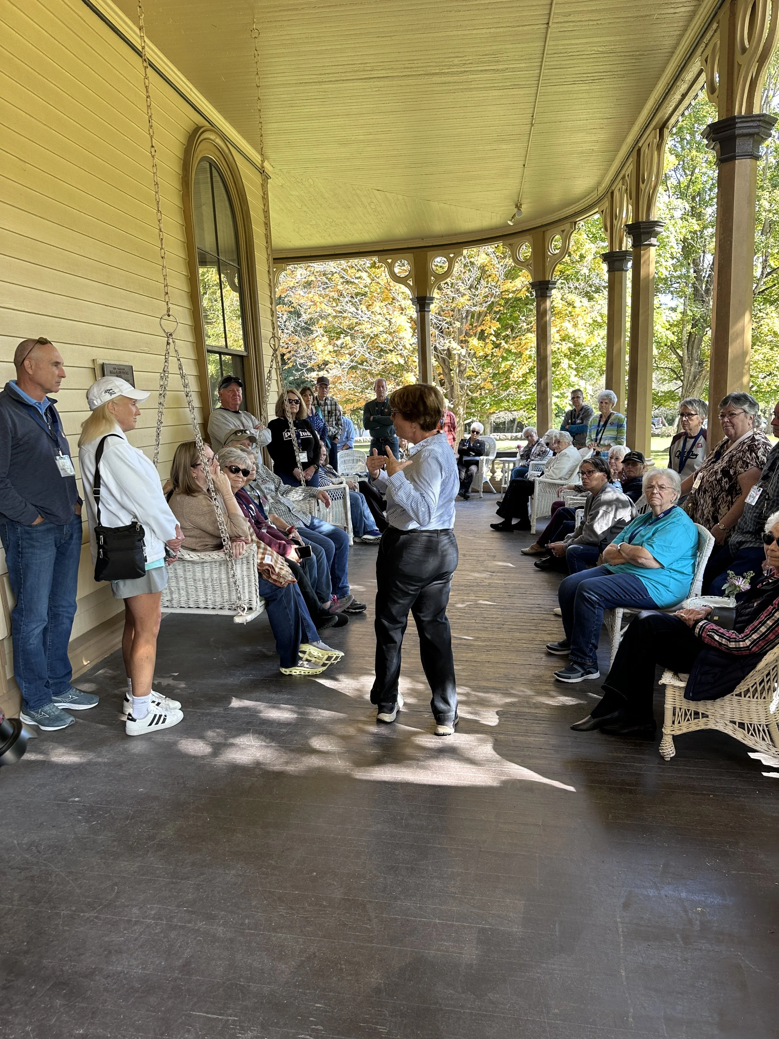 A pArk-McCullough docent gives an introduction on the veranda