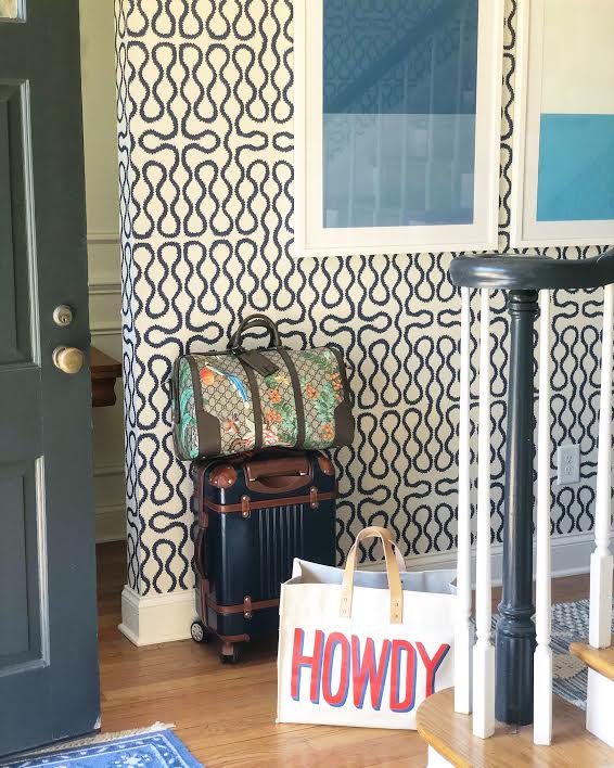 snap up our Howdy tote here - it’s perfect for traveling! You can also snap up our favorite spinner set , duffel bag and art now!