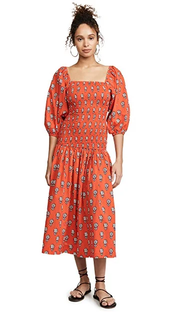 you know we can’t resist a patterned midi dress !
