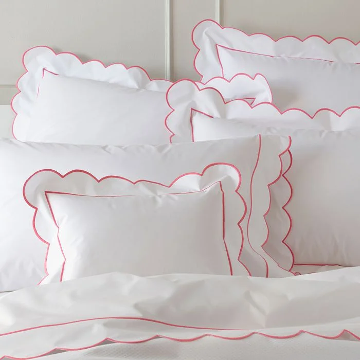 the most charming scalloped trim bedding with the perfect amount of color!