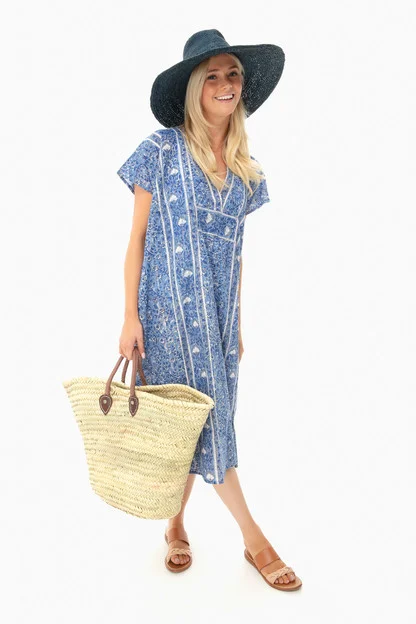 we adore this blue and white Embroidered cotton caftan - take a peek up close at the sweet details!