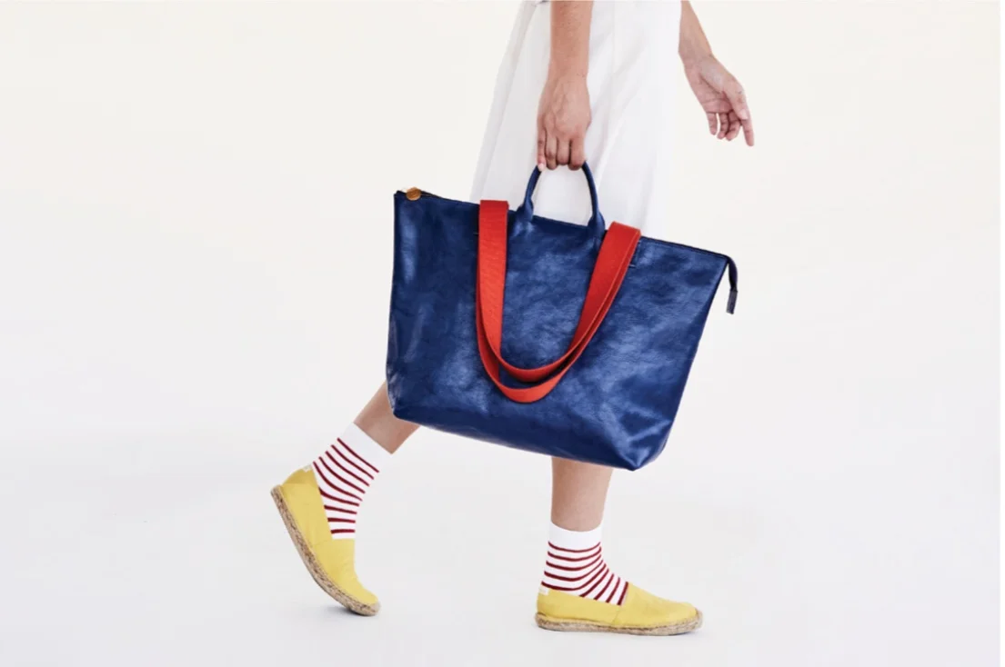 via: clare v. / snap up this high gloss Italian leather bag here