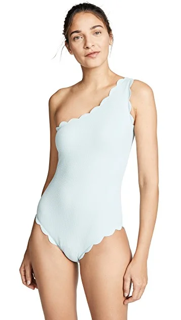 our favorite scalloped swimsuit (in the prettiest light blue) is on major sale! snap it up before it sells out!