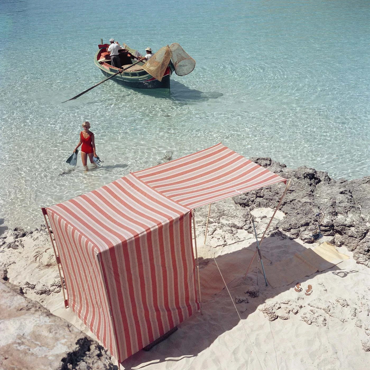 file this under places we’d rather be! photo: slim Aarons