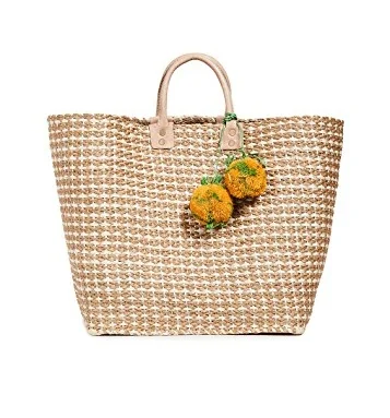 this braided rope bag stopped us in our tracks! and it comes in three happy colors!