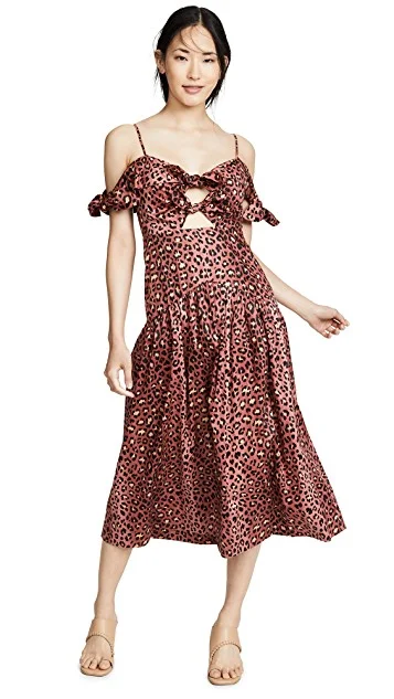 you know we can’t resist a leopard print dress (especially one with fun cutouts).