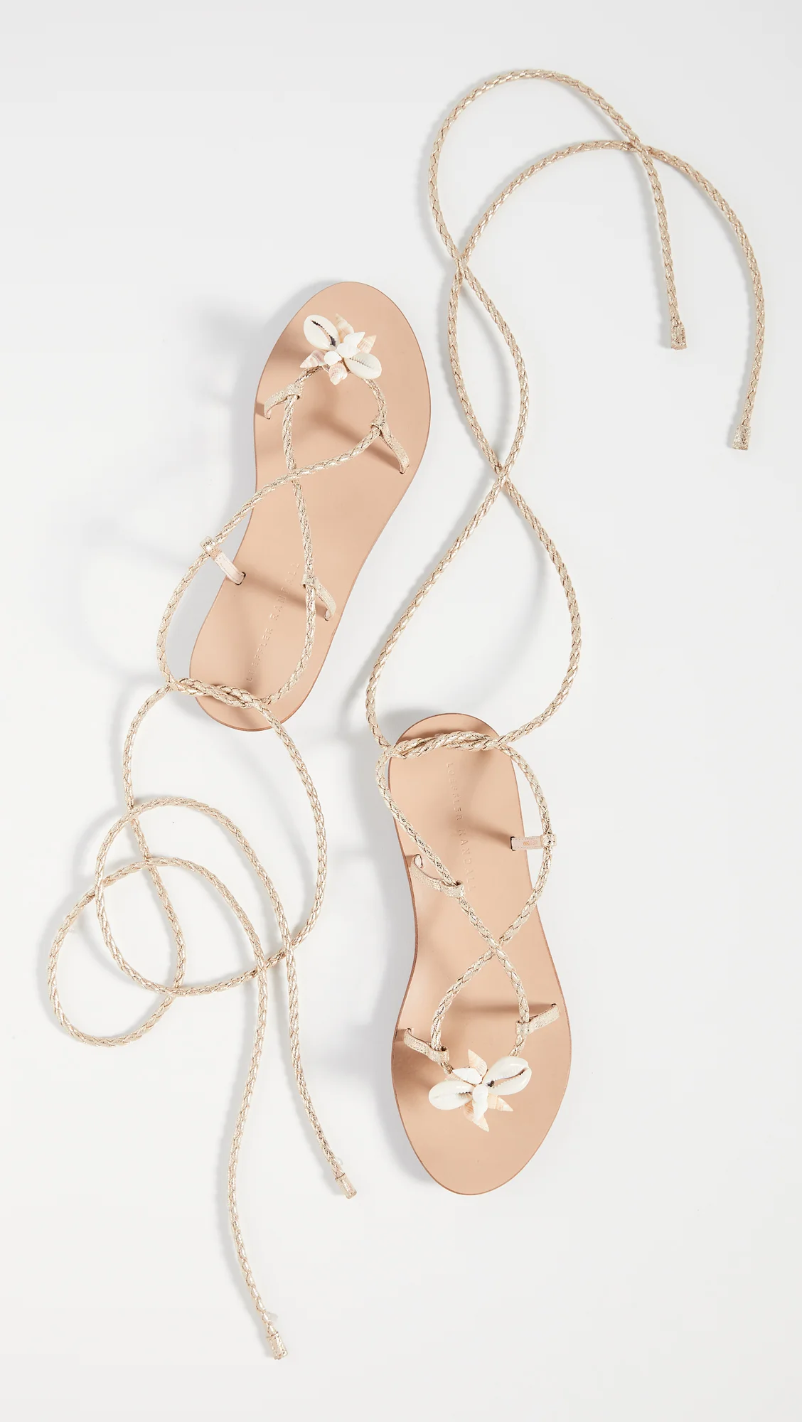 we just added these shell sandals to our getaway favorites !