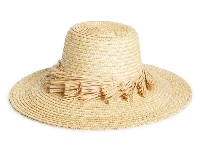 we adore the fringe detail on this straw hat (just $63)!
