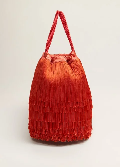 make a statement with this fringe bucket bag … under $100!