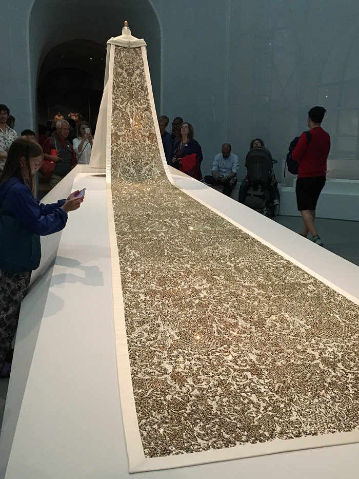 The centerpiece of the exhibition is this exquisite Chanel gown created by Karl Lagerfeld. 