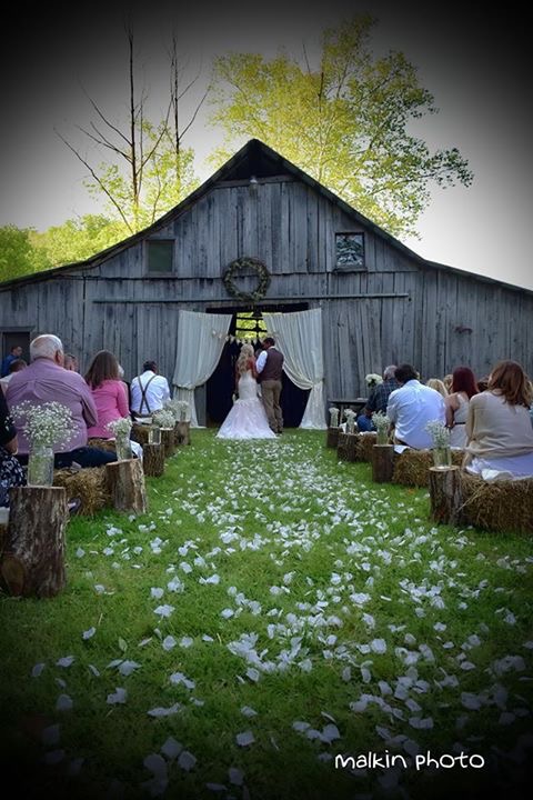 In front of barn