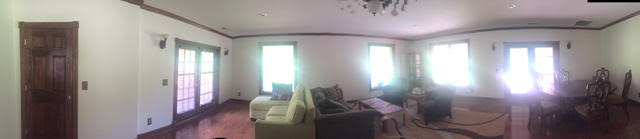 The Conference Room sports a comfortable livingroom environment and two entrances to the wrap-around deck 