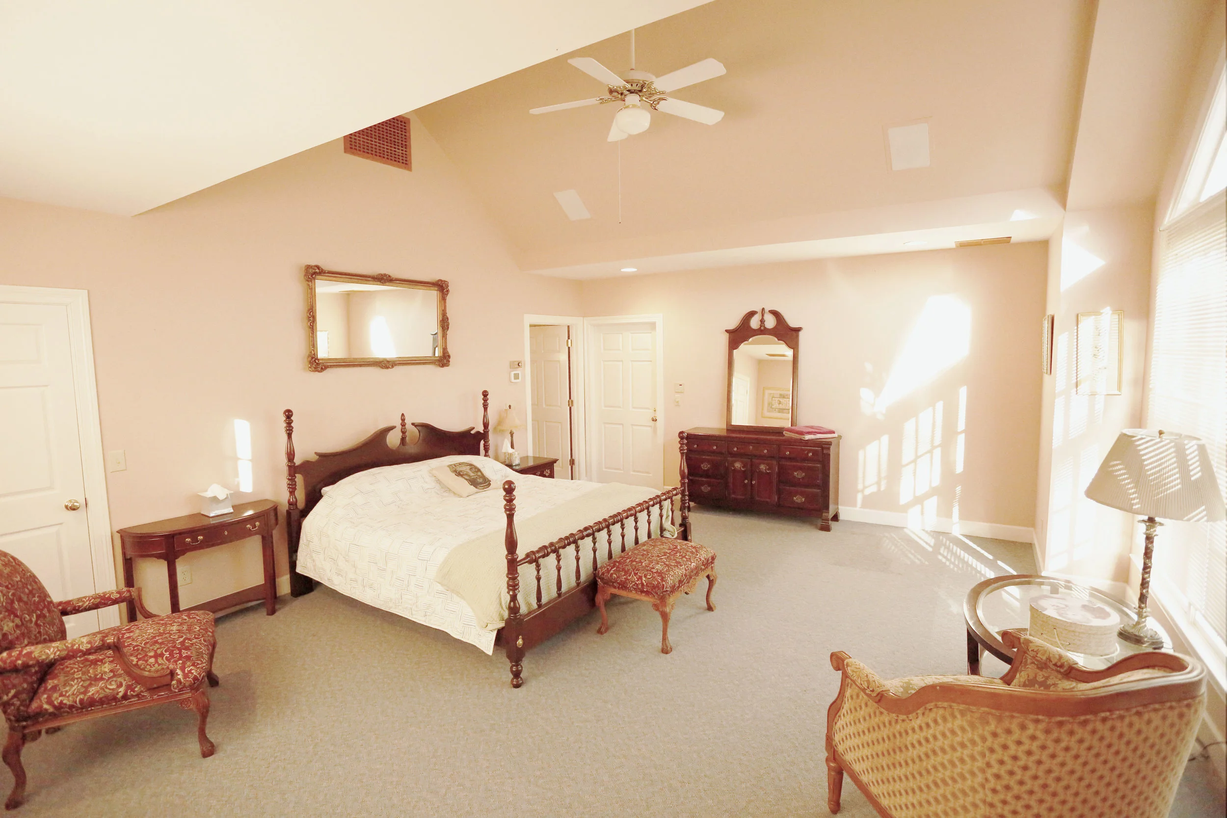The Mansion GardenView Room shares a full bathroom with the Balcony Room. Additional full and a single beds may be added.