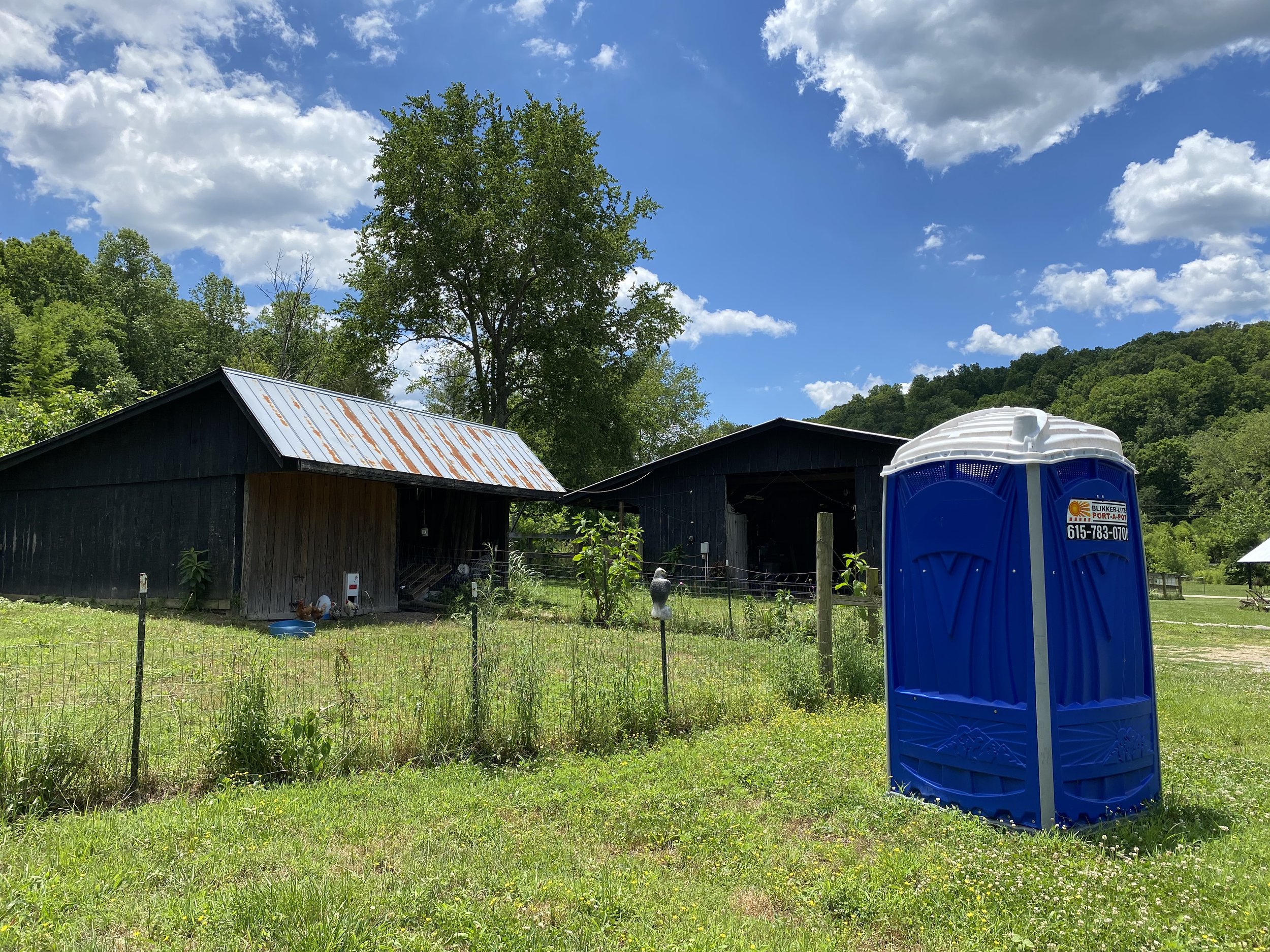 Portopotty and chicken coop.JPG