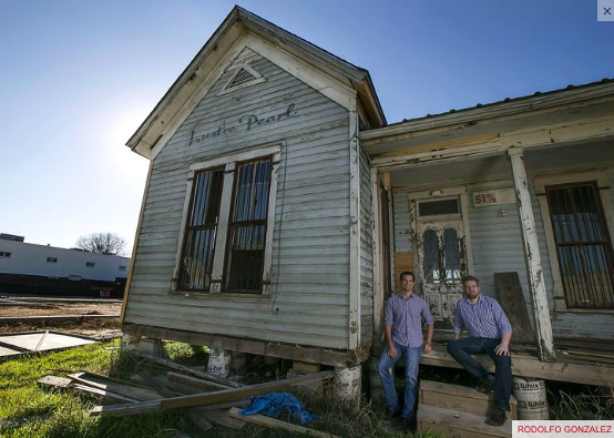 Rainey Ventures and its founders, Dale Glover, left, and Jesse Lunsford pose for a portrait on the front porch of the Lustre Pearl building on Tuesday, Feb. 10, 2015 in Austin. RODOLFO GONZALEZ / AMERICAN-STATESMAN