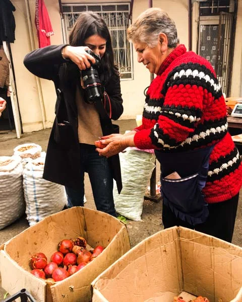 Anna M., one of our Tumo student friends, at work at the central market in Stepanakert shooting pomegranates. Here's what she shot .