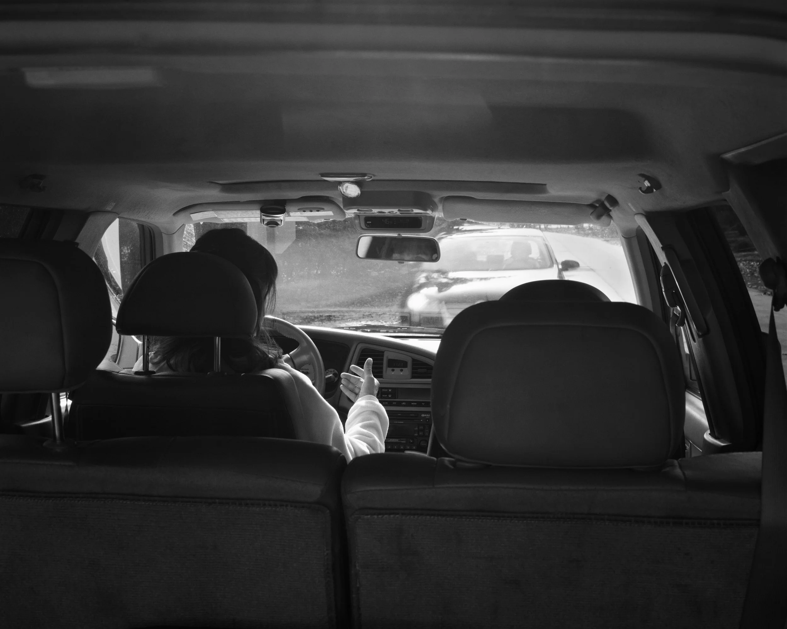  Removed is a series of large format black and white photographs that are of individuals performing as if they are using their devices although their phones and tablets have been physically removed from their hands moments prior to the exposure.

Rem