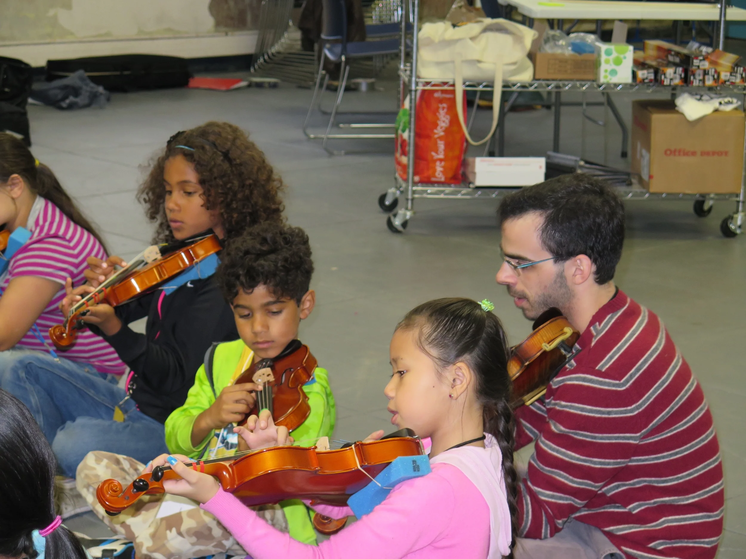 Buffalo State College student Evan Courtin works with BSW students.jpg