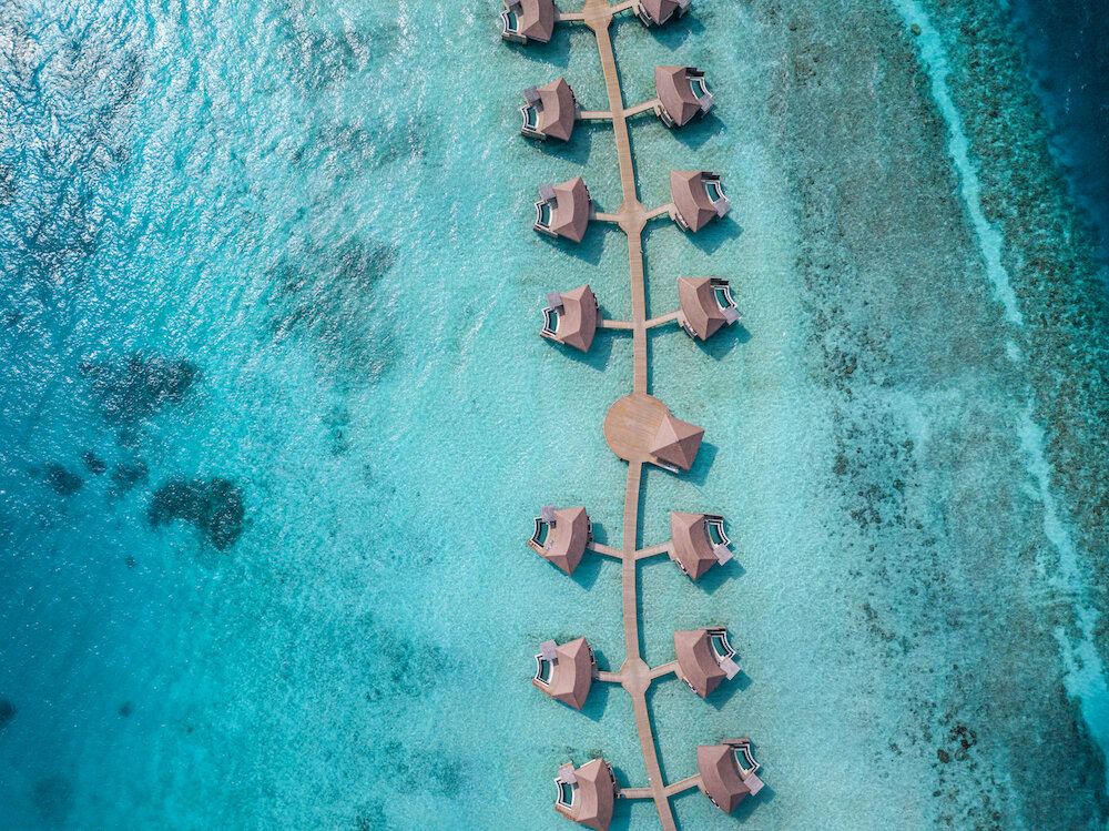InterContinental Maldives  - Hero shot - Overwater Pool Villas (Aerial View) copy.jpg