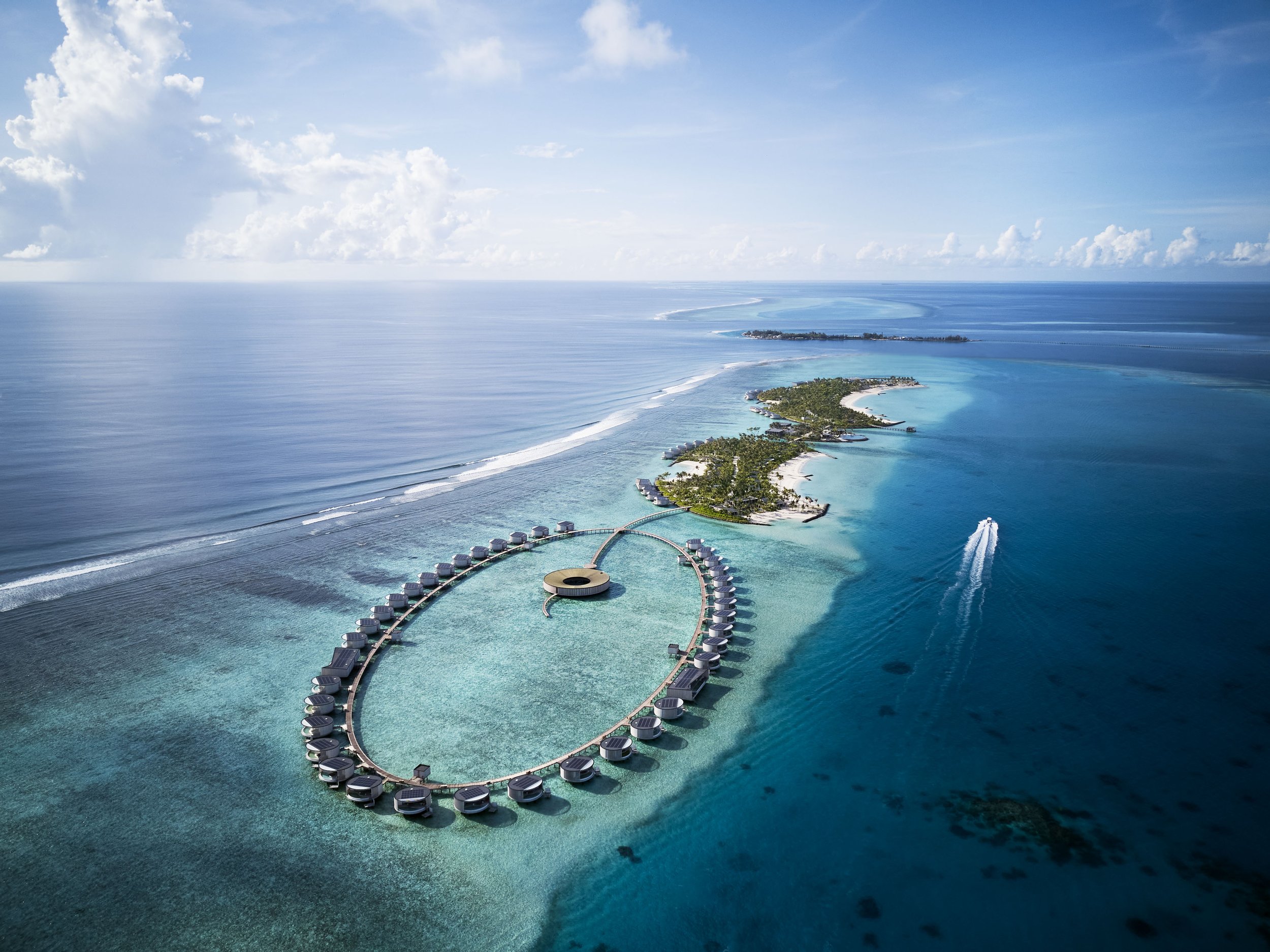 The Ritz-Carlton Maldives, Fari Islands - Aerial Boat.jpg