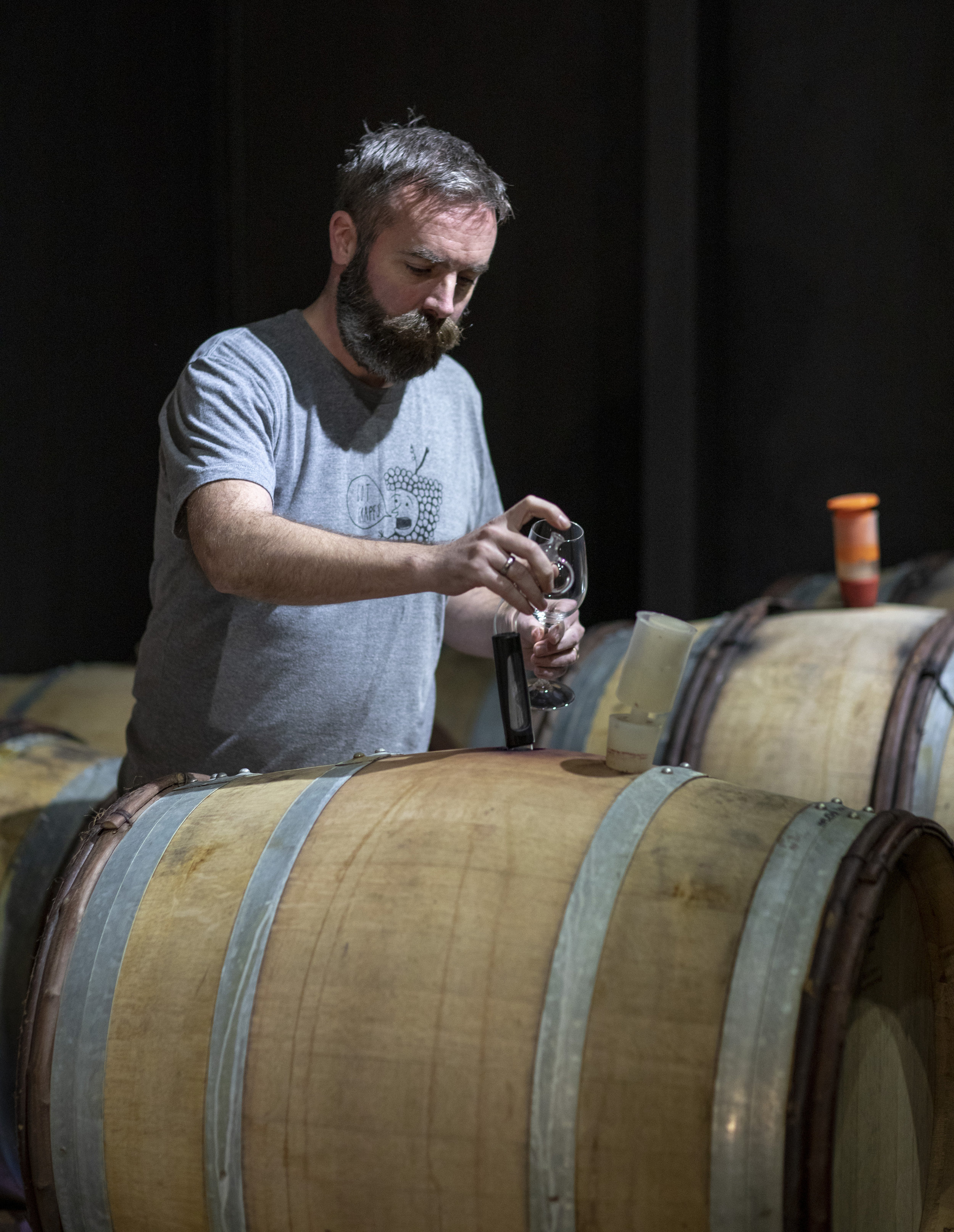 Keith tasting the barrels