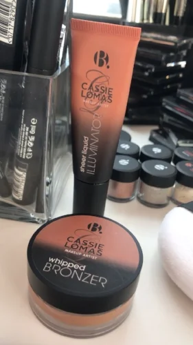 B. Cassie Loms Sheer Liquid Illuminator Highlighter- £9.99 B. Cassie Lomas Universal Bronzer- £9.99 When you mix pigments with a liquid illuminator they turn into a high shine metallic cream eyeshadow. My whipped bronzer also works great as a base on the eyelid for patting pigment over the top. 