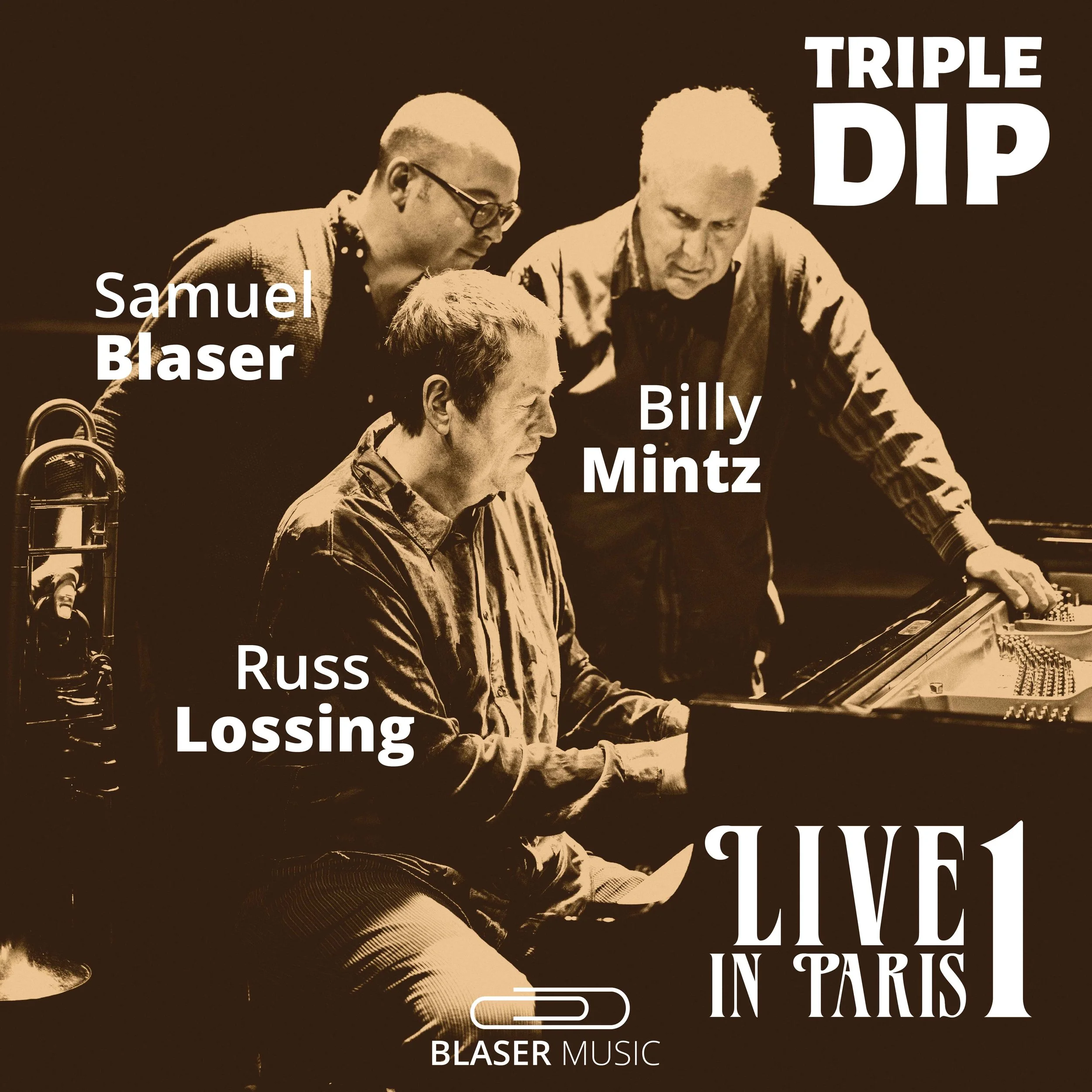 Promotion image of a jazz trio performing live in Paris. The image features three musicians: Samuel Blaser, Billy Mintz, and Russ Lossing, with their names labeled. The text 'TRIPLE DIP' and 'LIVE IN PARIS' is also displayed, along with the Blaser Music logo.