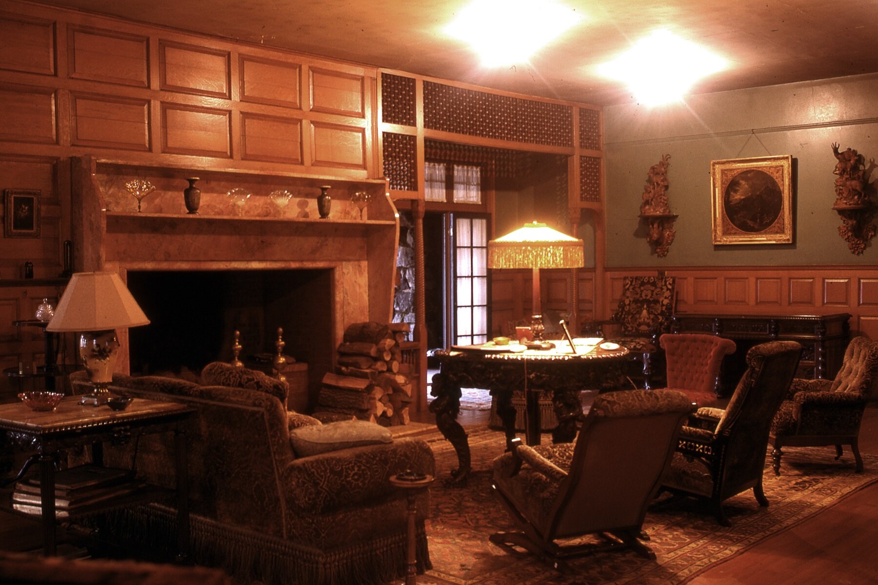 My step grandmother, for whom I was named, always sat in a dark green cut velvet chair to the left of the fireplace and by the huge, ornate mahogany table in the middle of the room.