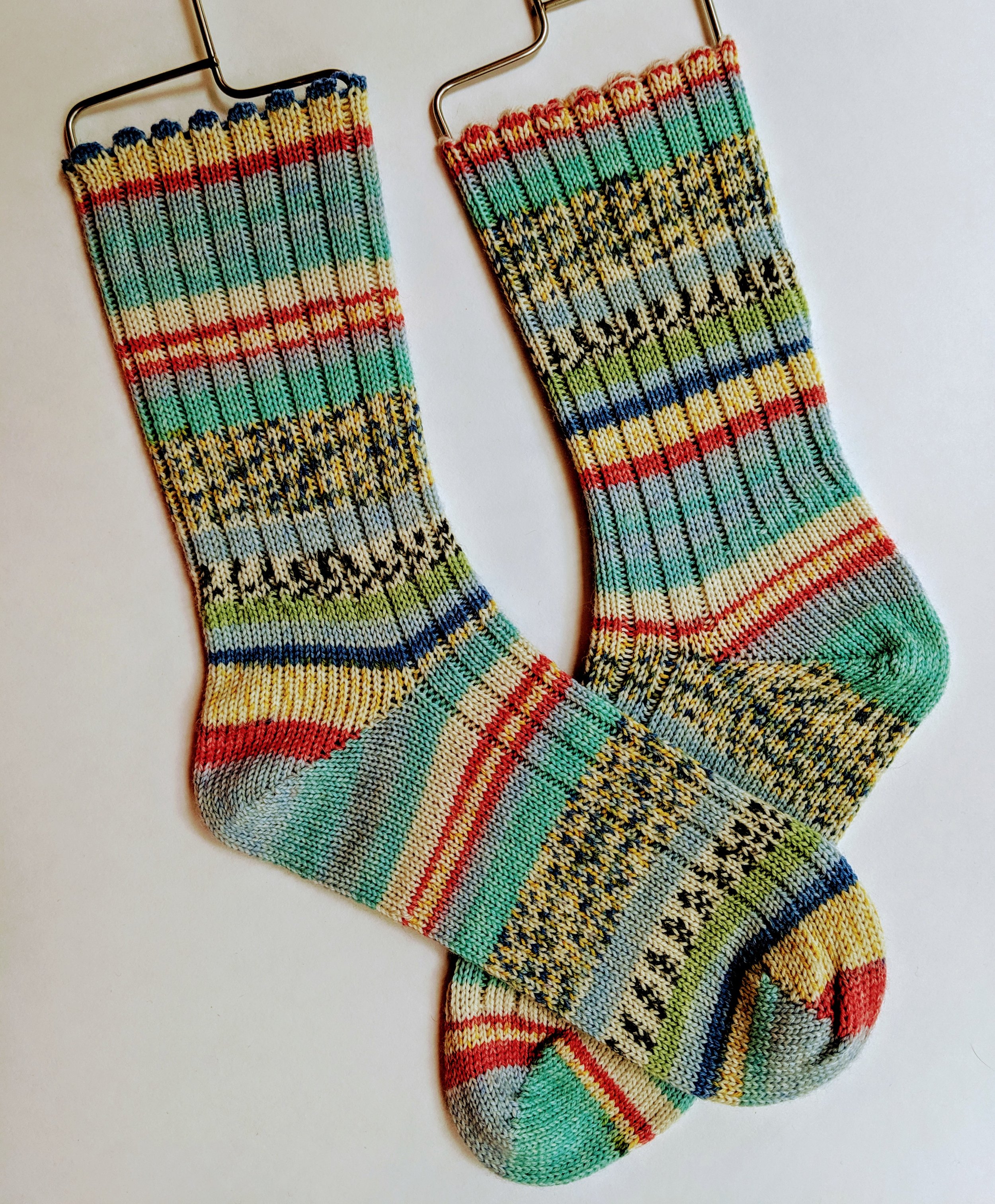 Random stripe ribbed socks; wool and nylon