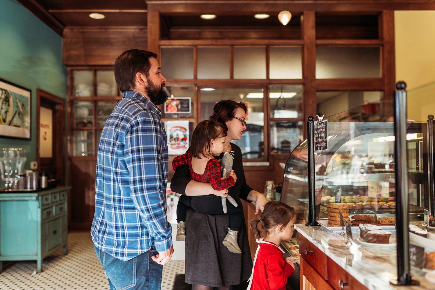 family in bakery in wauwatosa, wisconsin making choices