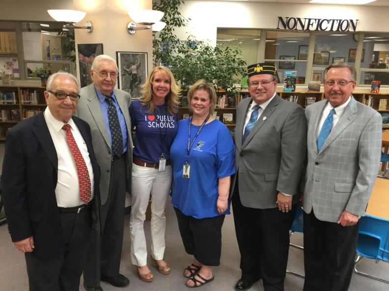 Teacher of the Year Jan McKeown with Bruce Wood, Jerry Pigsley, and Mike Gray