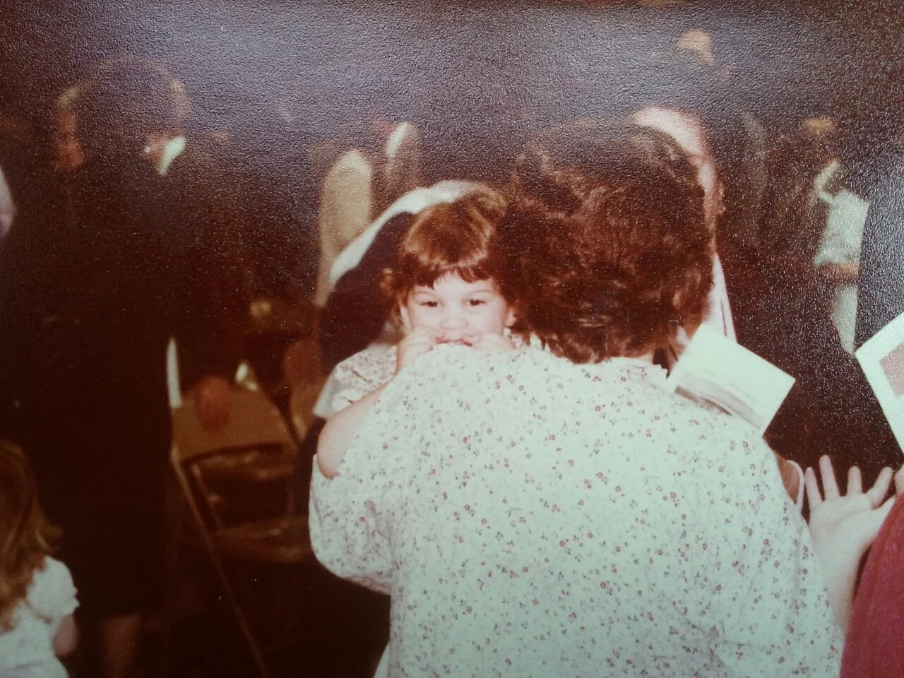 This moment matters to me. That is me as a young girl being held by my mom. I love it beacuse even though it's the back of her head, her hand gesture says it all to me and reminds me that she loved friends and a good conversation. I don't know who took this photograph and it's a small miracle that I have it, but I am so very glad they did! My mother passed away in 2001.