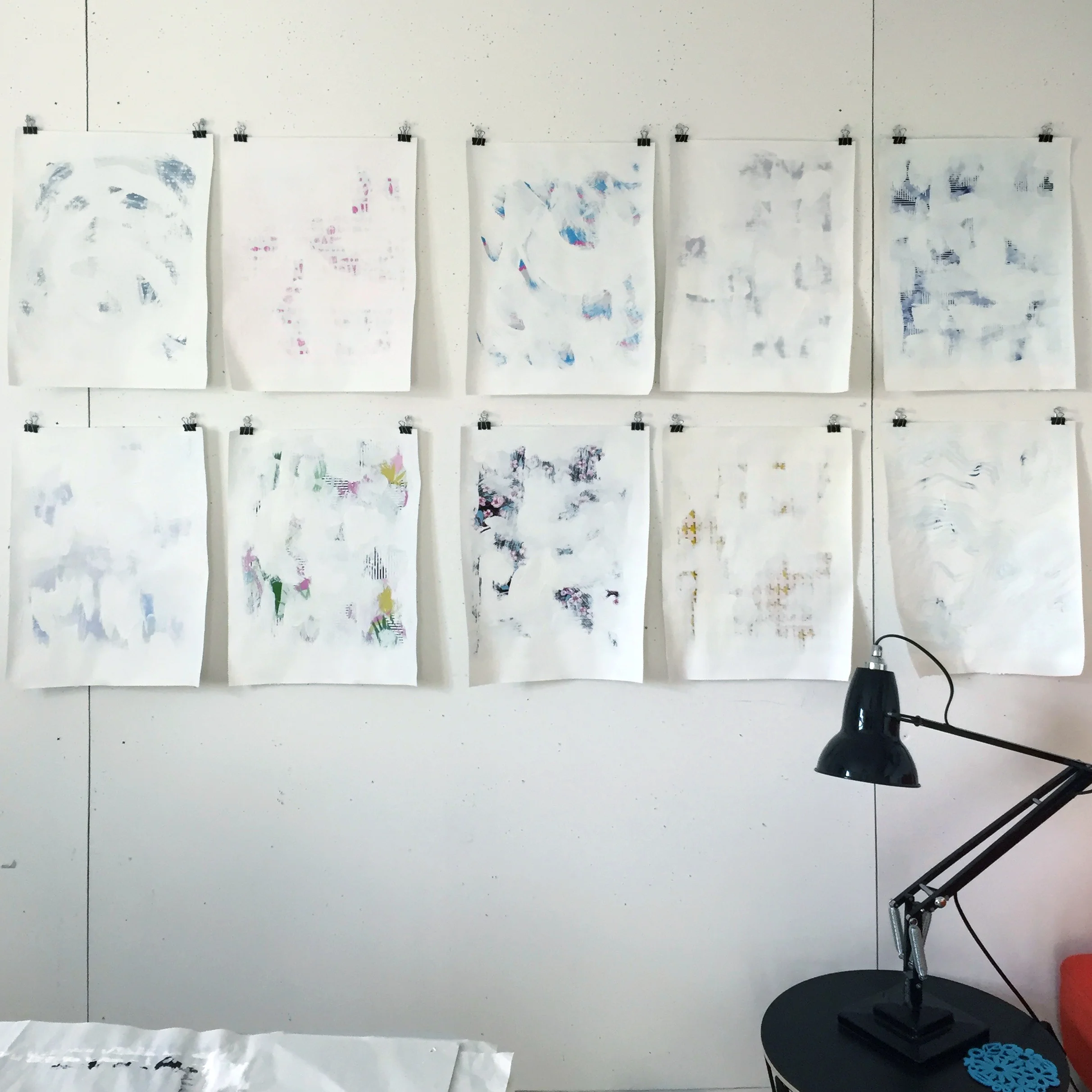 Lots of early beginnings on the studio wall