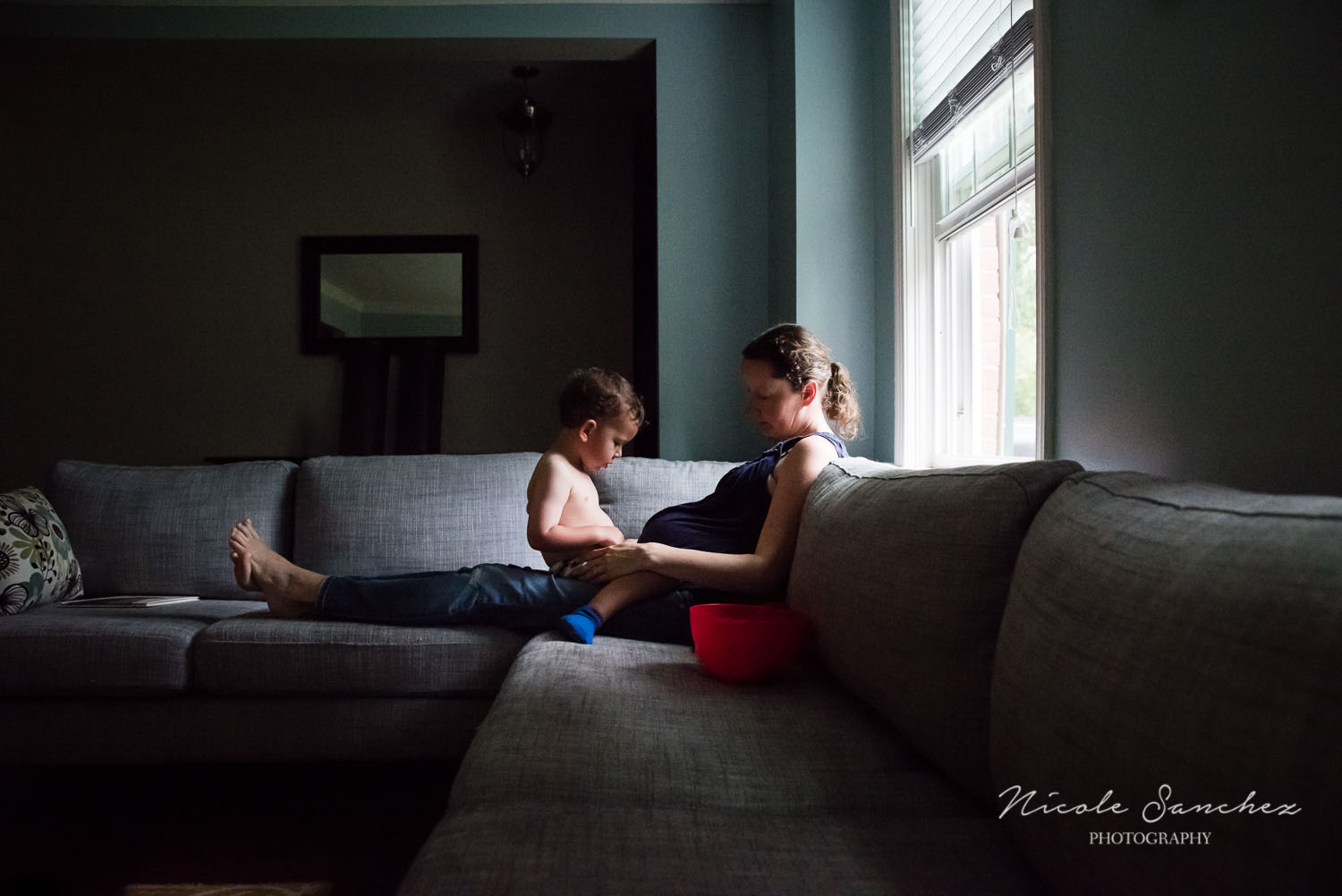 Maternity Self-Portrait Reading on Couch