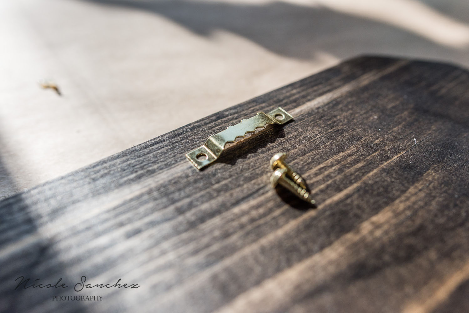 ttaching sawtooth picture hanger | northern va lifestyle family photographer