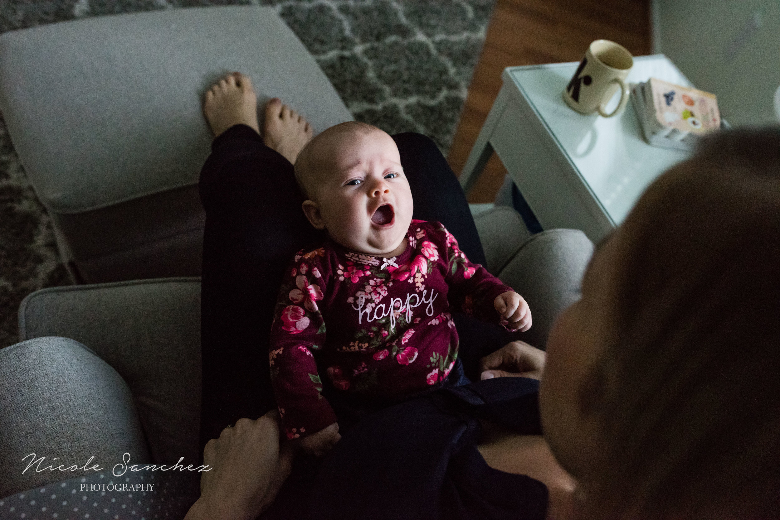 Baby girl crying in mom's lap | McClean, VA Family Photographer