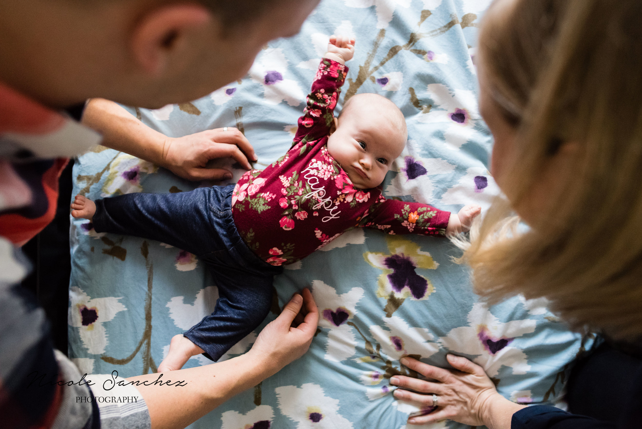 Cute baby stretching on bed | McClean, VA Family Photographer