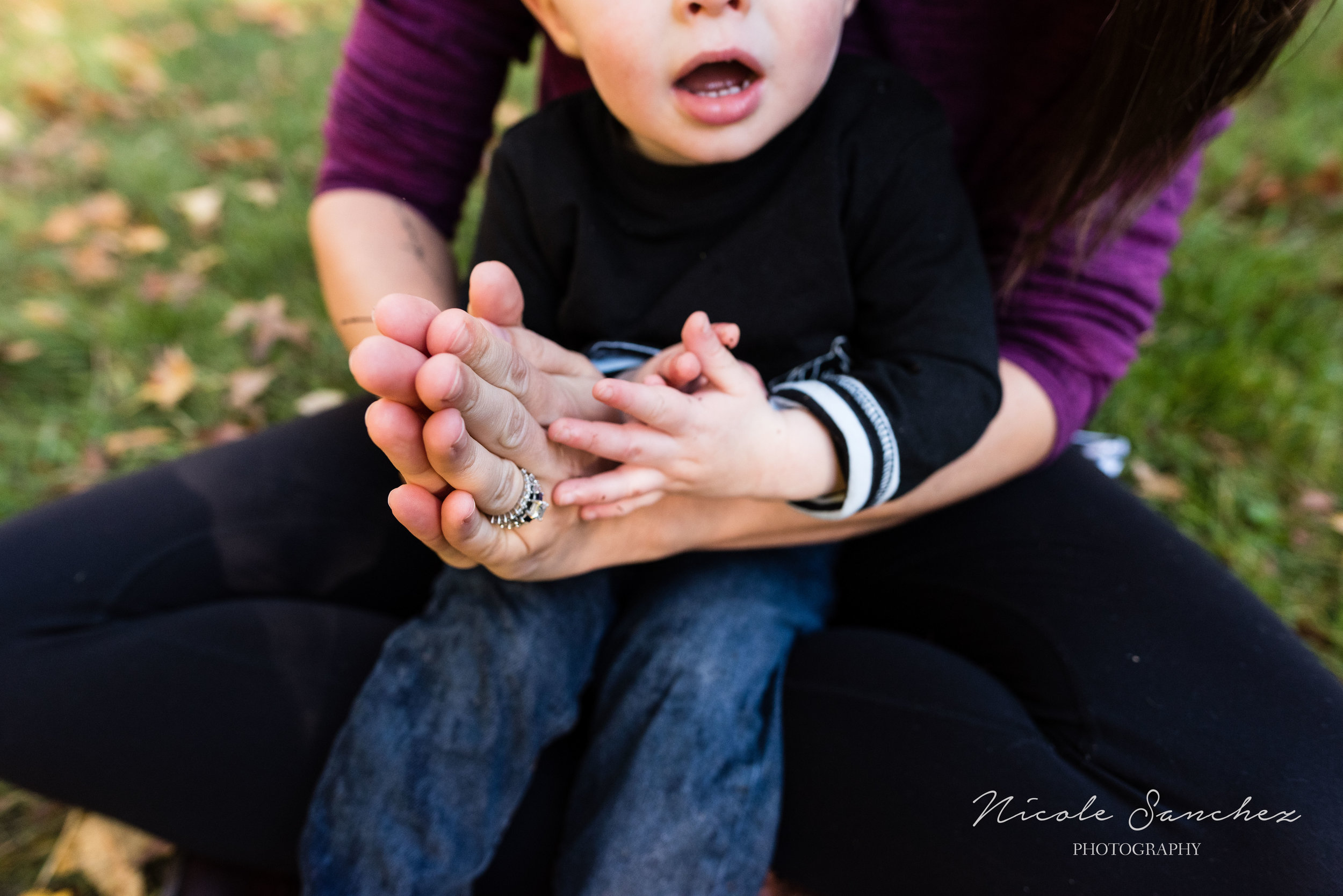 Mom holding hands with son | Alexandria, VA Family Photographer