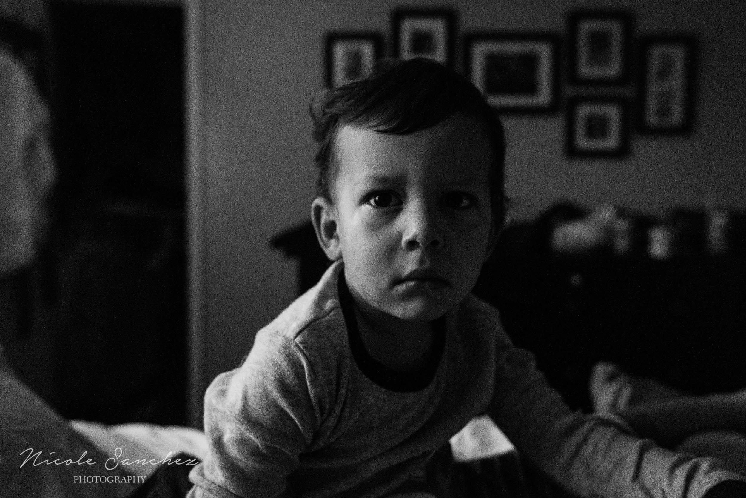 Portrait of sleepy boy just waking up in Northern Virginia by Nicole Sanchez Photography