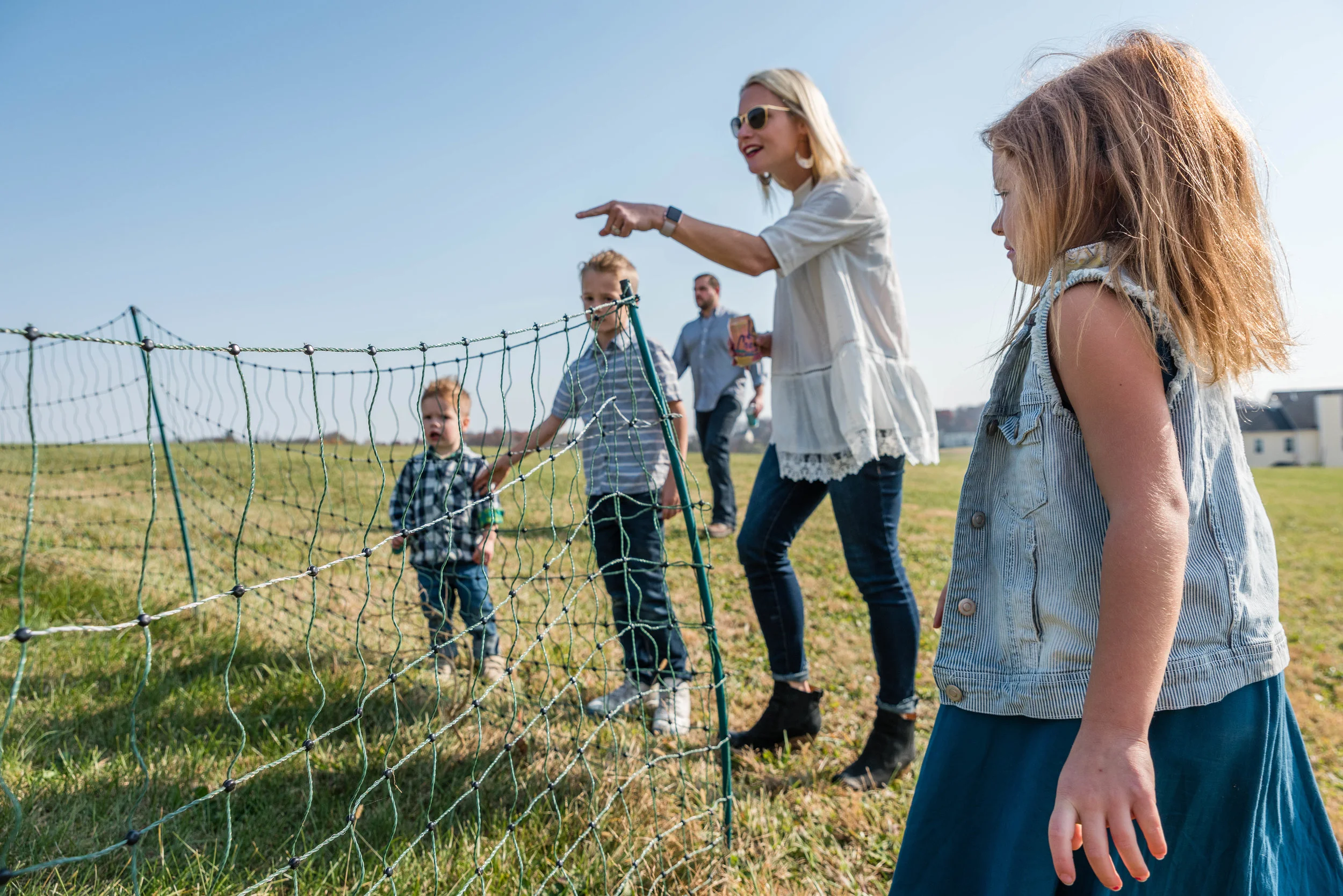 Candid unposed family photo by Northern Virginia Photographer Nicole Sanchez