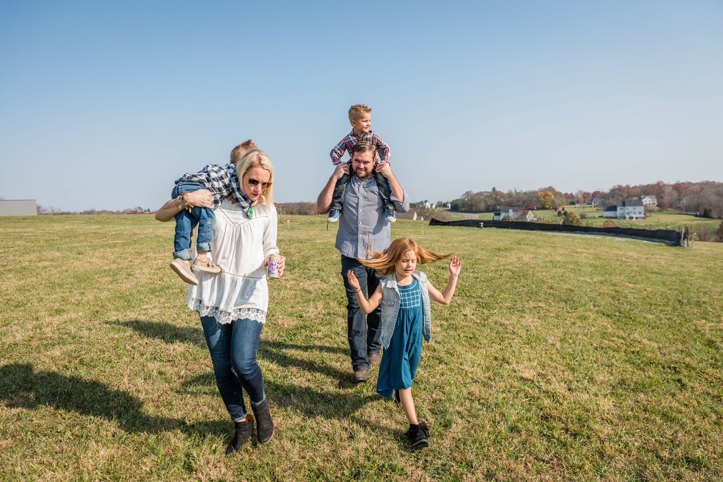 Candid family unposed outdoors by NOVA Family Photographer Nicole Sanchez