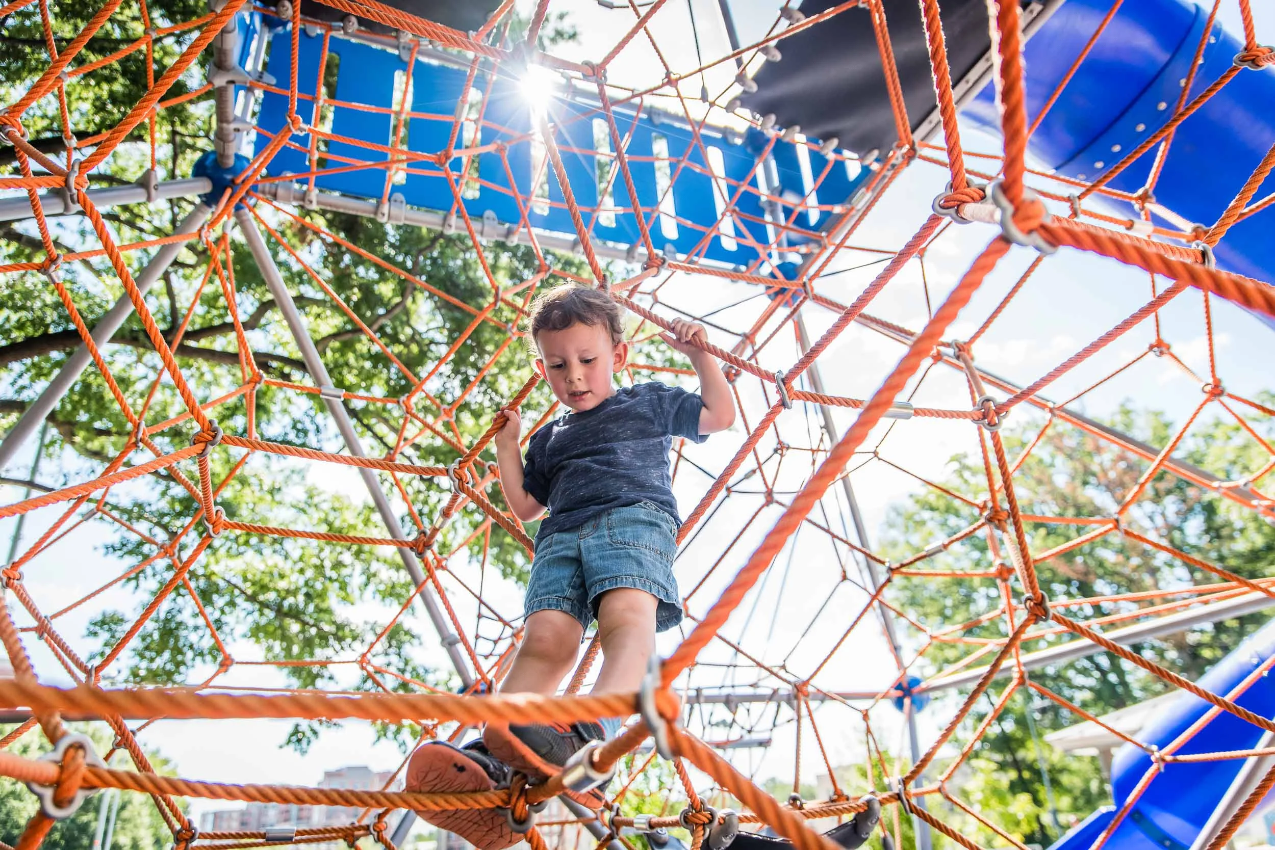 boy climbing at rocky run park in arlington virginia