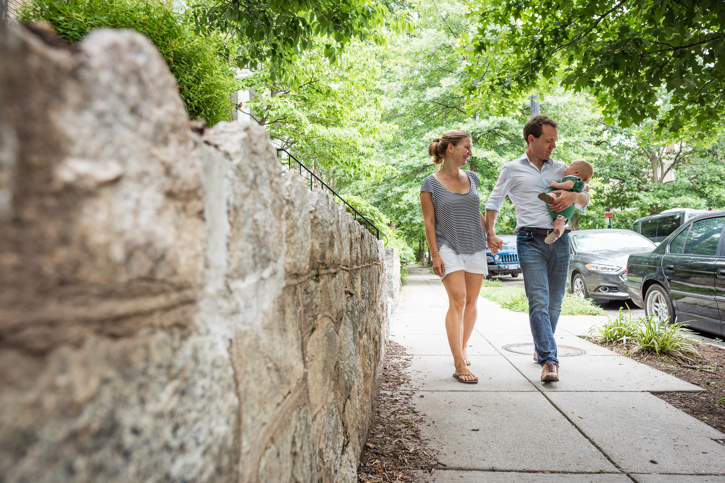 Family on a walk with baby in Washington, DC by Lifestyle Photographer Nicole Sanchez
