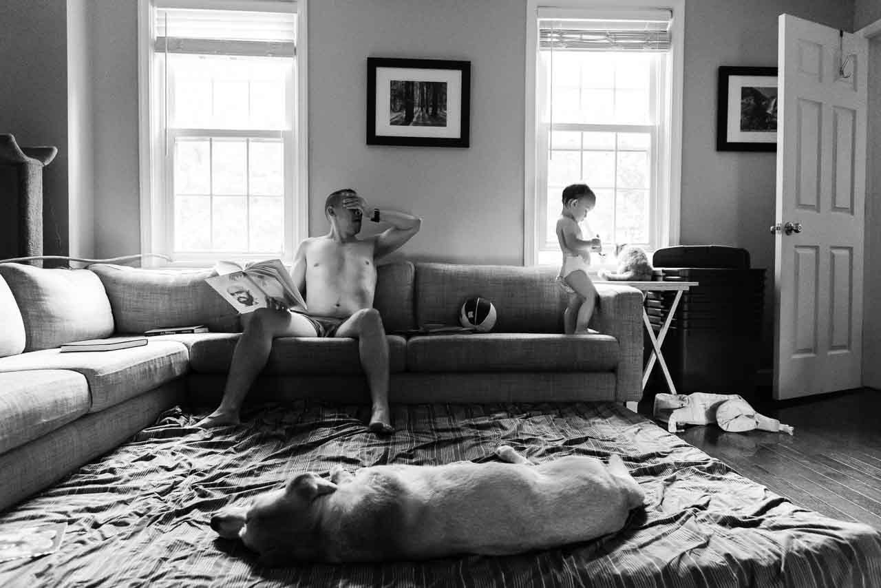 Tired dad with toddler and dog by Northern Virginia Family Photographer Nicole Sanchez