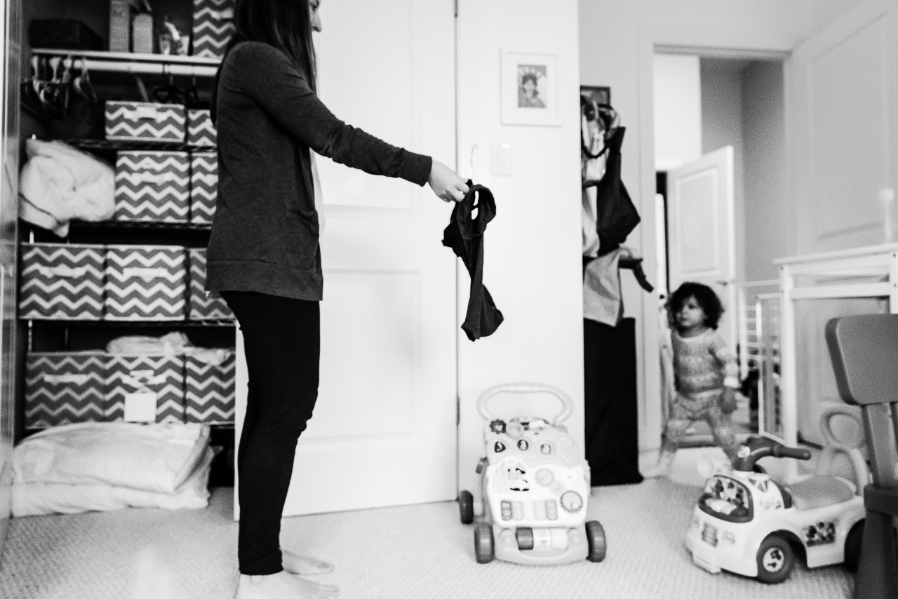 Mom trying to get toddler dressed