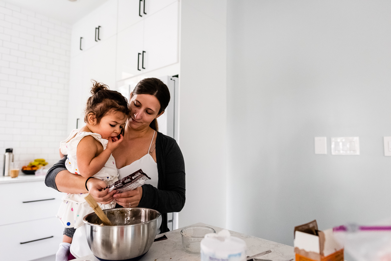 Mom and daughter baking together