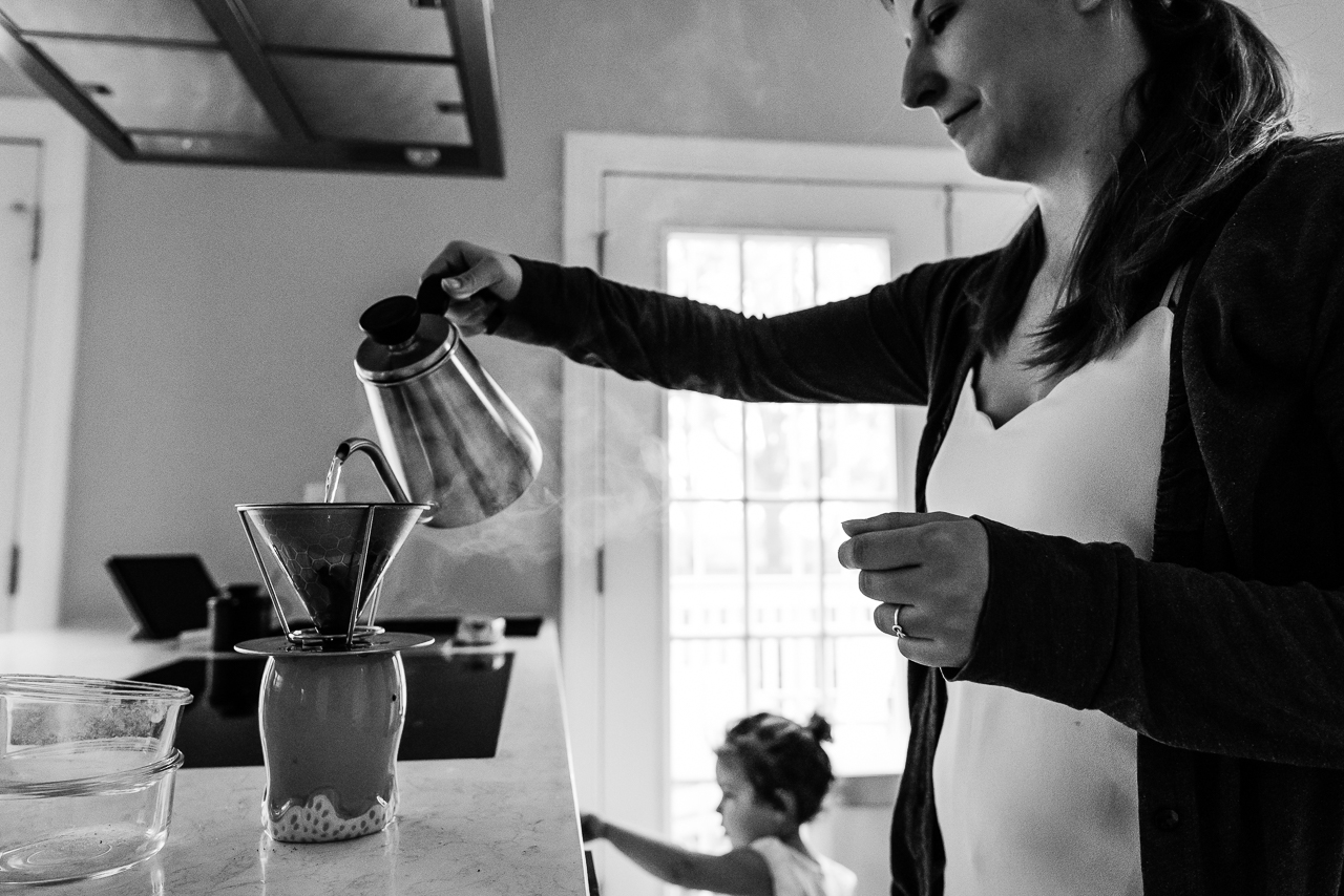 Mom pouring coffee with daughter