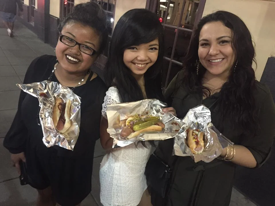 Friends enjoying Nibbles hot dogs